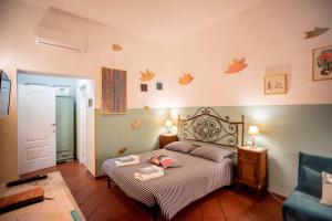 A bed or beds in a room at Trastevere Dream House
