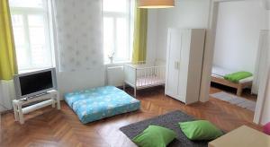 Telewizja i/lub zestaw kina domowego w obiekcie City-Apartments Langegger