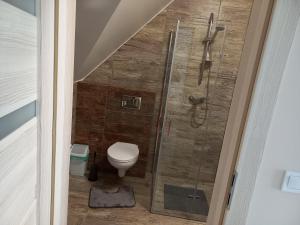 Kúpeľňa v ubytovaní Apartamenty Na Rozstaju