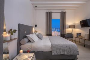 Posteľ alebo postele v izbe v ubytovaní Mykonos Princess Hotel + 37 fotografií