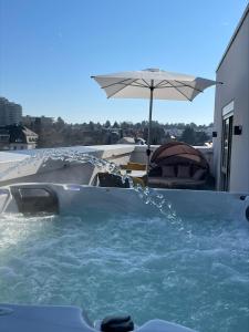 a boat in the water with an umbrella at The Blasky in Frankfurt/Main