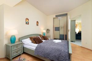 Posteľ alebo postele v izbe v ubytovaní Polana Szymoszkowa Apartment with Mountain View by Noclegi Renters