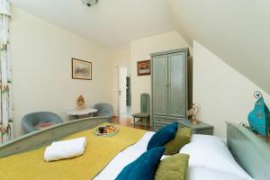 Posteľ alebo postele v izbe v ubytovaní Polana Szymoszkowa Apartment with Mountain View by Noclegi Renters