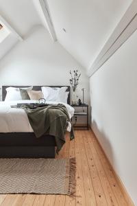 Postel nebo postele na pokoji v ubytování B&B Vossebergen Hombeek