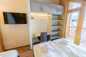 Posteľ alebo postele v izbe v ubytovaní Hillside Chalet Kreischberg