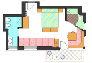 a floor plan of a house with furniture at Albergo Arnica in Canazei