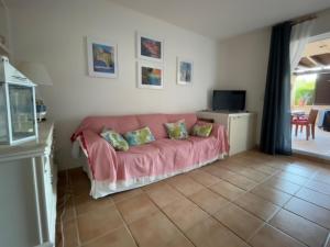 Ένα ή περισσότερα κρεβάτια σε δωμάτιο στο Apartamentos Arcos Calabardina +20 φωτογραφίες