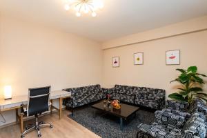 Χώρος καθιστικού στο Harmony Apartment II