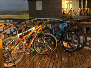 a group of bikes parked on a deck at Vale de cambara I in Cambará