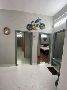 a hallway in a house with a room with at Elegant & Luxurious Villa at Film Nagar, Jubilee Hills near Apollo in Hyderabad
