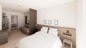 Postel nebo postele na pokoji v ubytování Astron Hotel Rhodes