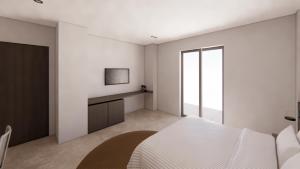 Postel nebo postele na pokoji v ubytování Astron Hotel Rhodes