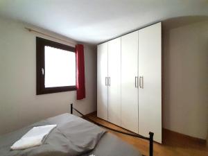 Postel nebo postele na pokoji v ubytování IL RUSTICO Appartamento