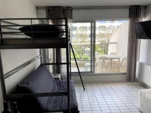Posteľ alebo postele v izbe v ubytovaní Au Thalassa - 3min Plage - CLIM - TERRASSE - WIFI