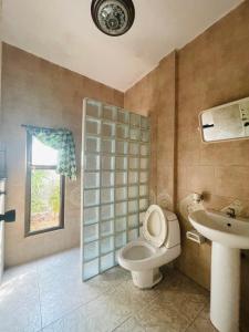 Koupelna v ubytování Meewaya Hotel