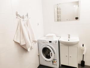 Kúpeľňa v ubytovaní Apartament Piernikowe Serce