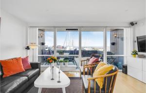 A seating area at Lovely Home In Tranekr With House Sea View