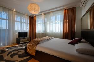 Postel nebo postele na pokoji v ubytování Apart K Apartments