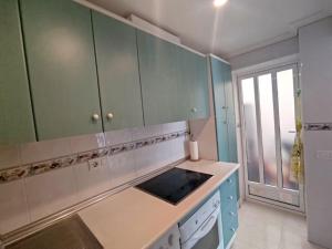 Kuchyňa alebo kuchynka v ubytovaní Rincon Mediterraneo Gran Alacant
