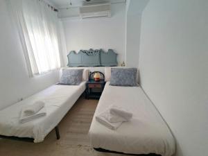 Posteľ alebo postele v izbe v ubytovaní Rincon Mediterraneo Gran Alacant