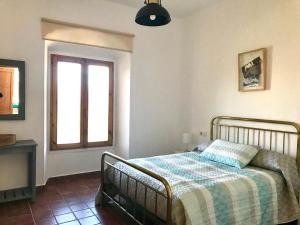 En eller flere senge i et værelse på La Almedina casa Bellavista + 41 billeder