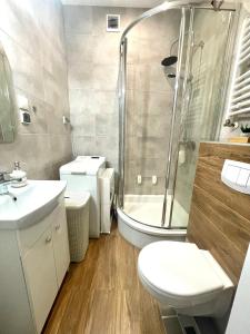 Kúpeľňa v ubytovaní Apartament Jaskółka