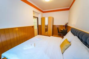 Posteľ alebo postele v izbe v ubytovaní Lukas Apartments