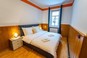 Posteľ alebo postele v izbe v ubytovaní Lukas Apartments
