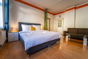 Posteľ alebo postele v izbe v ubytovaní Lukas Apartments