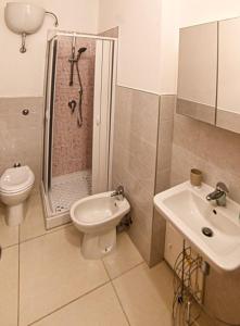 Koupelna v ubytování Portupaleddu Apartment
