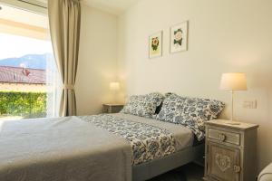 Postel nebo postele na pokoji v ubytování Bellavista Apartments