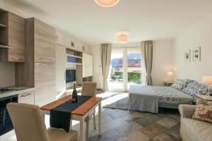 Postel nebo postele na pokoji v ubytování Bellavista Apartments + 37 fotografií
