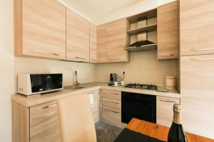 Kuchyň nebo kuchyňský kout v ubytování Bellavista Apartments