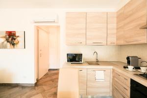 Kuchyň nebo kuchyňský kout v ubytování Bellavista Apartments