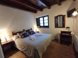 Postel nebo postele na pokoji v ubytování Inmocyma Residencial Linsoles-Valle de Benasque