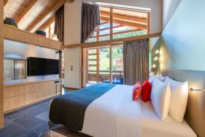 Postel nebo postele na pokoji v ubytování W Verbier