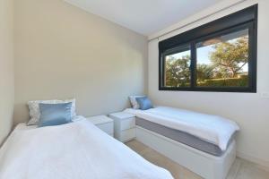 Posteľ alebo postele v izbe v ubytovaní Luxurious 3 bedroom apartment in Jardinana Azalea in La Cala de Mijas