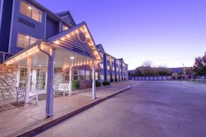 a building with lights on the side of it at River Canyon Lodge in Moab