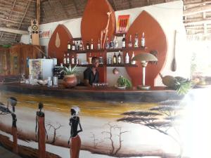 Area lounge atau bar di Ebony & Ivory Beach Bungalows