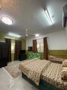 Letto o letti in una camera di Cloudy Cloud Farm Resort