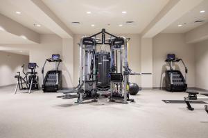 a gym with several treadmills and exercise bikes at The Westin La Paloma Resort & Spa in Tucson
