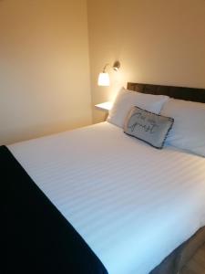Ein Bett oder Betten in einem Zimmer der Unterkunft Atlantic way Apartment