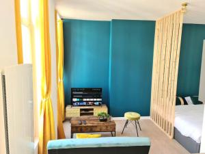 Posteľ alebo postele v izbe v ubytovaní Le Cosy Central Moderne et Chaleureux