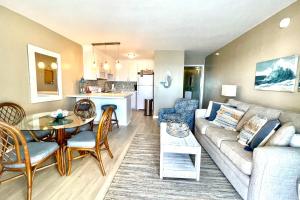 a living room with a couch and a table at Perdido Sky 72 in Perdido Key