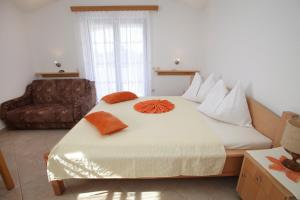 Posteľ alebo postele v izbe v ubytovaní Apartments Villa Macola