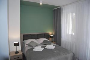 Voodi või voodid majutusasutuse Hotel w Dobieszkowie toas