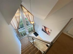 an image of a staircase in a house at Trewhiddle Villa 29 in St Austell