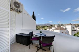 Balkon lub taras w obiekcie Stylish Penthouse Duplex at Matchroom Country Club