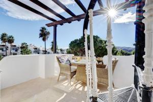Balkon lub taras w obiekcie Stylish Penthouse Duplex at Matchroom Country Club