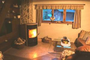 Posezení v ubytování Charming cottage KLARA with Sauna, Nature&Privacy near Prague